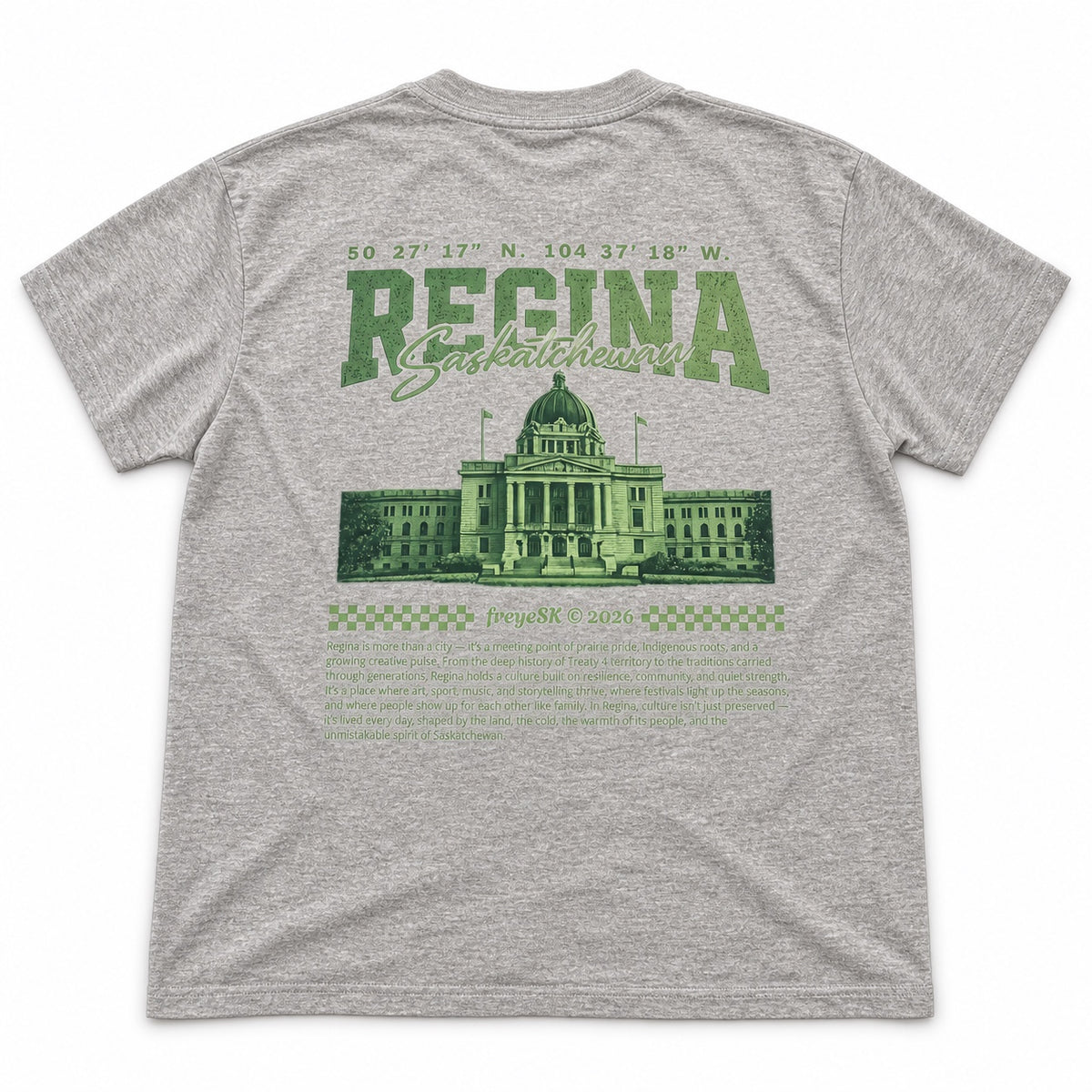 Back of a grey T-shirt with muted green Regina Saskatchewan lettering, a domed landmark and checkerboard accents.