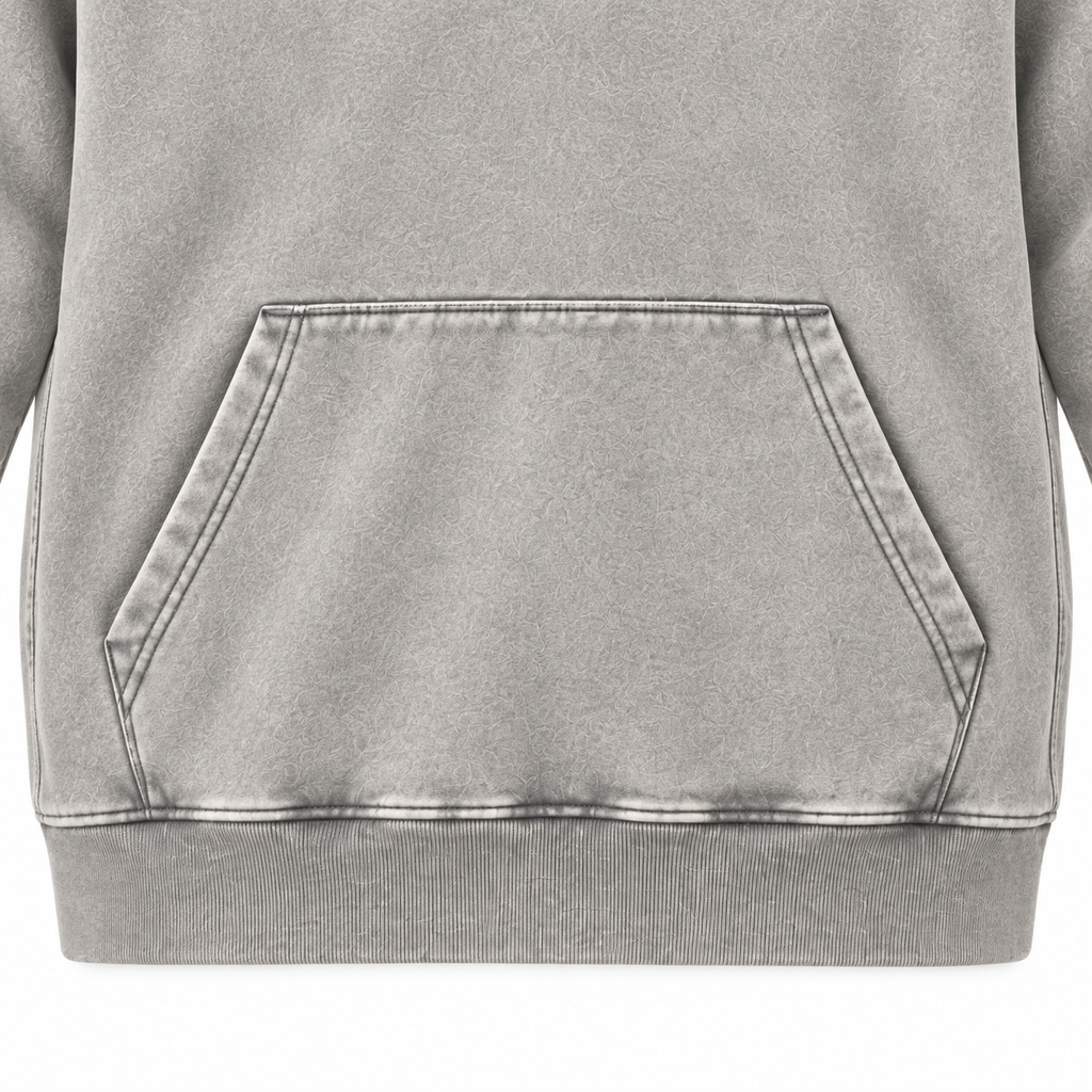 Close-up of the light grey hoodie kangaroo pocket, stitching and ribbed hem.